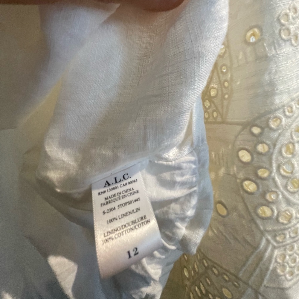 A.L.C. Sexy Ivory linen Mason front twist top w/eyelet sleeves. Size runs small! - Picture 15 of 16